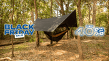 Man in Nakie Hammock camping ecosystem in the bush Nakie - Australia