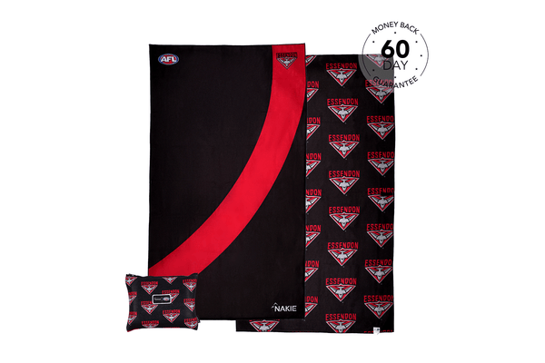 Essendon Bombers black beach towel with red curved stripe and repeating team logo pattern, includes matching small pouch.