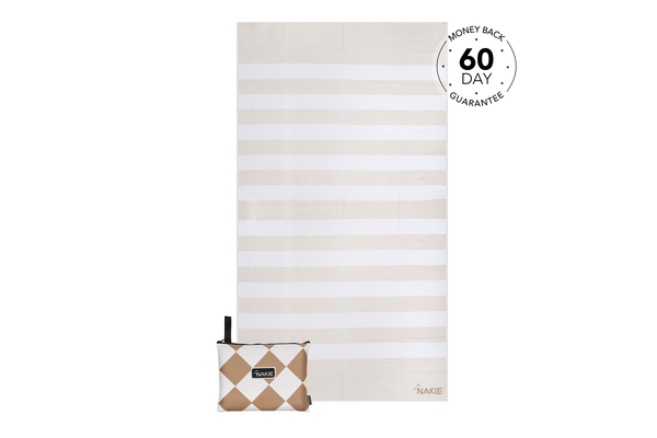 Beige and white striped beach towel with matching diamond-patterned carrying pouch and black handle.