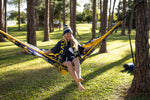 Person sitting in a Nakie NRL Cowboys hammock with trees in the background preview #2
