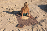 Luna Glow recycled sand-free beach towel in taupe with celestial print, laid on sand beach preview #2