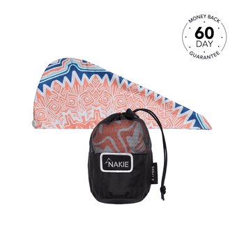 Hair wrap towel in coral and navy geometric pattern with black mesh storage pouch